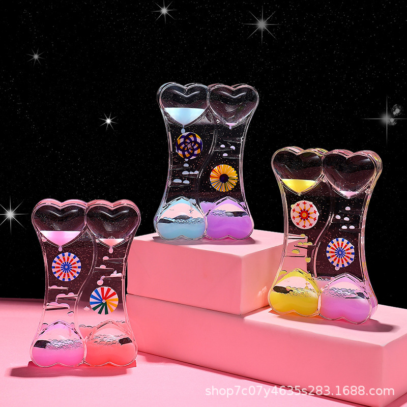 Pumpkin Cart creative new product desktop pen holder small decorative item, Douyin popular cartoon decoration floating hourglass sand toy Application Scenario