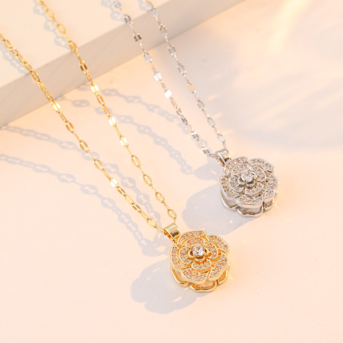 European and American cross-border rotatable flower titanium steel necklace, a niche design, simple and fashionable, retro style collarbone chain accessory Application Scenario