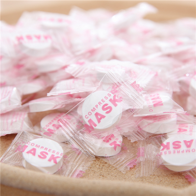 Stock disposable compressed mask particles outdoor travel portable mask paper factory directly for 50 bags Specification drawing