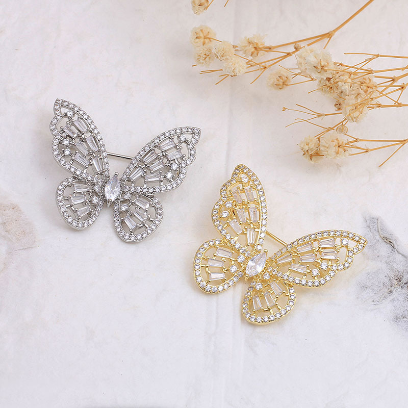 Wholesale of fashionable and light luxury micro-inlaid zircon butterfly brooches, elegant suit pins, and anti-exposure corsages