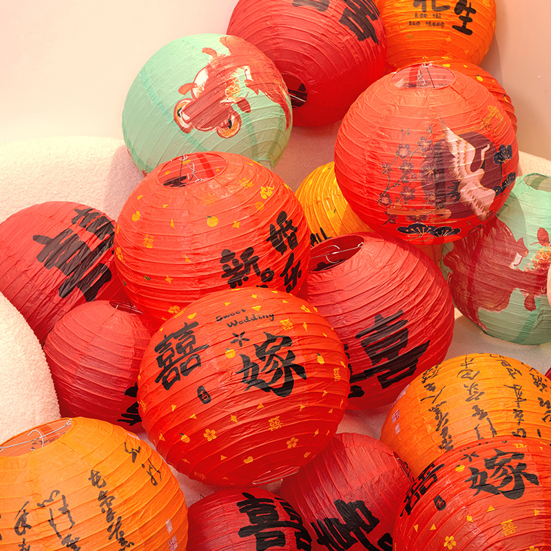 "Happy character lanterns, wedding decorative items, honeycomb balls, hand-folded paper lanterns, ancient-style wedding decorations.