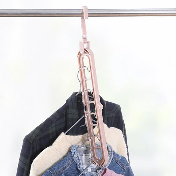 Multi-functional nine-hole clothes hanger, home storage clothes hanger, wardrobe, popular folding, retracting magic rotating 9-hole hanging clothes hanger Application Scenario