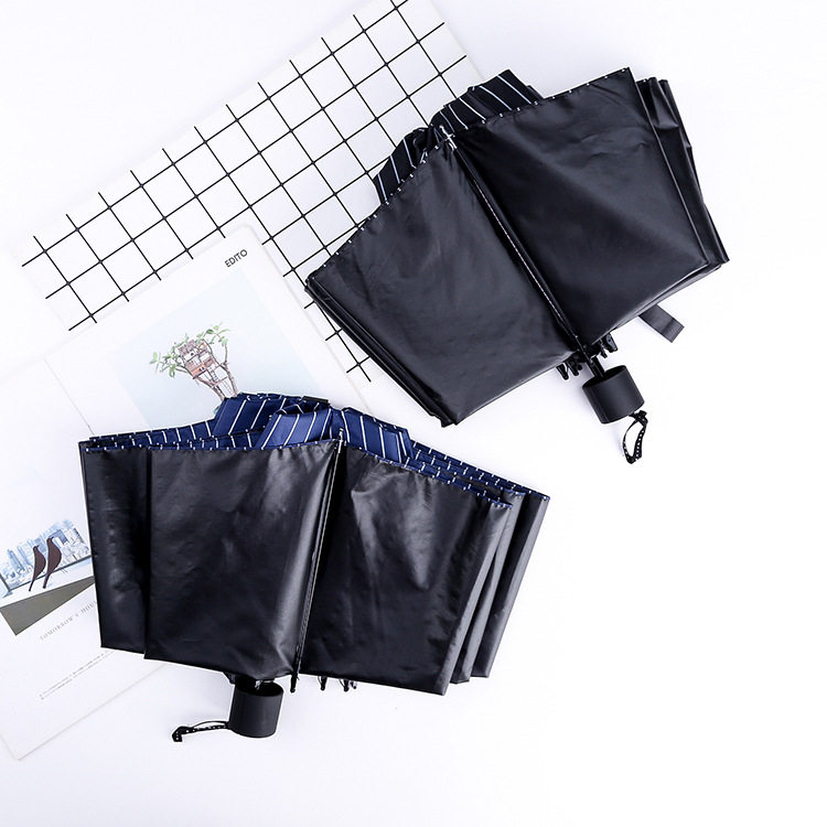 Factory wholesale three-fold 10-bone enlarged black rubber umbrellas, fashionable striped checkered umbrellas, UV-resistant sun umbrellas