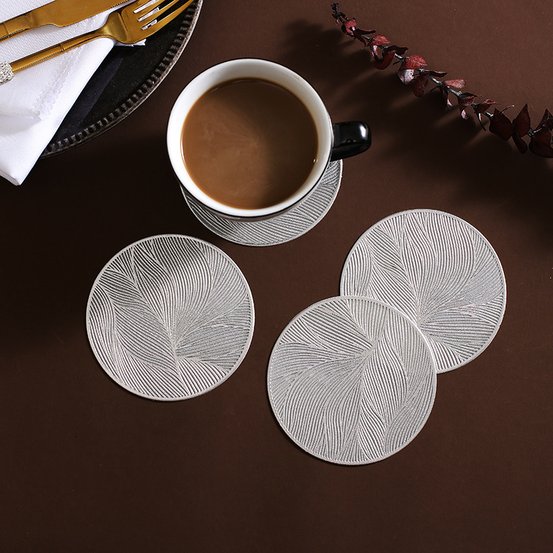 Nordic style high-end coasters, heat insulation pads, light luxury, high appearance level, Wanxianghua simple, high-temperature resistant round household teacup pads Specification image