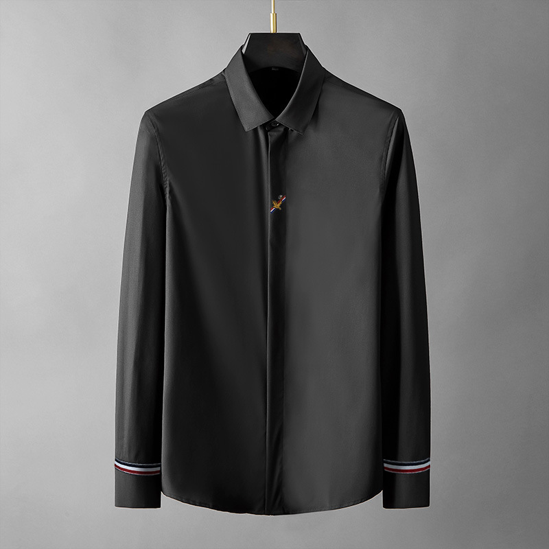 This is a new men's trendy brand from European Spring and Autumn. It features a slim and stylish bird-embroidered shirt and a high-end simple woven strap with a slight elasticity details Picture