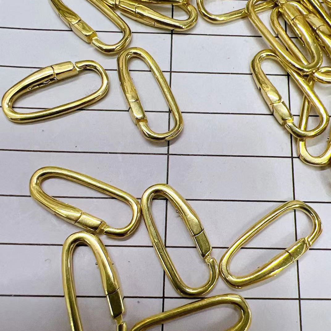 The irregular-shaped oval buckle, O-shaped ear ring, brass bag buckle, accessory connecting buckle, and rectangular lobster buckle are selling well across borders Specification image
