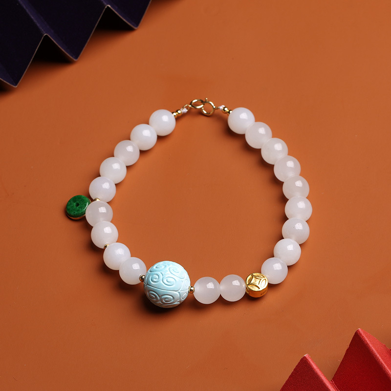 A single-loop bracelet made of white jade and Hetian jade, 999 gold coins, turquoise, meander beads, hanging dry green, and peace pendant for women