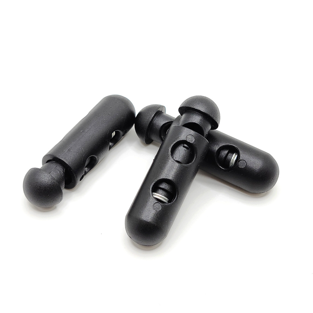 Capsule-shaped plastic spring buckle, special-shaped elastic band rope buckle, cylindrical double-hole adjustable button, black pig nose buckle Specification image