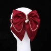 The new elegant satin pearl bow hair clip is simple and stylish. It is a high-end and versatile top clip for engagement banquets Application Scenario