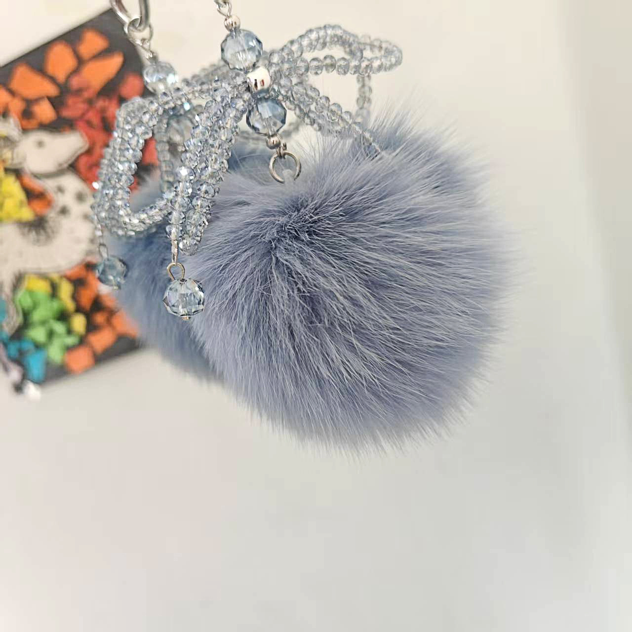 冬季新品狐狸绒球双蝴蝶结水晶泪滴设计挂饰手机链钥匙扣包包挂饰