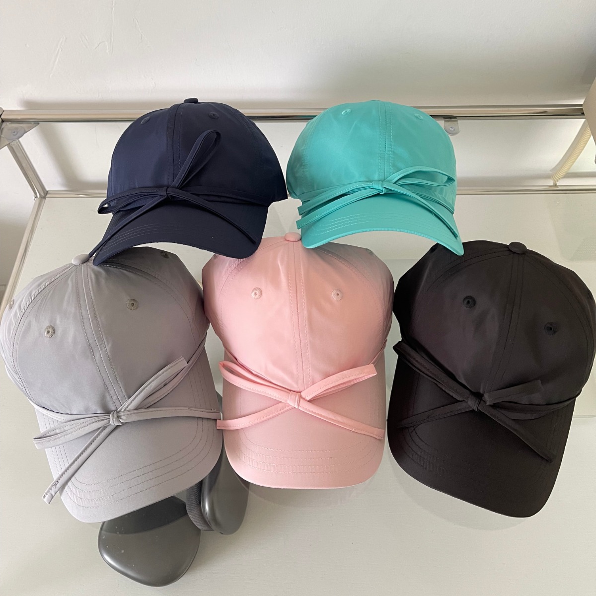 A new thin, quick-drying bow baseball cap for women in spring and summer from South Korea, with a large head circumference that makes the face look smaller. Instagram