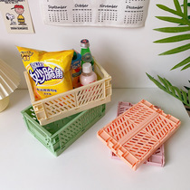Collapsible plastic storage box