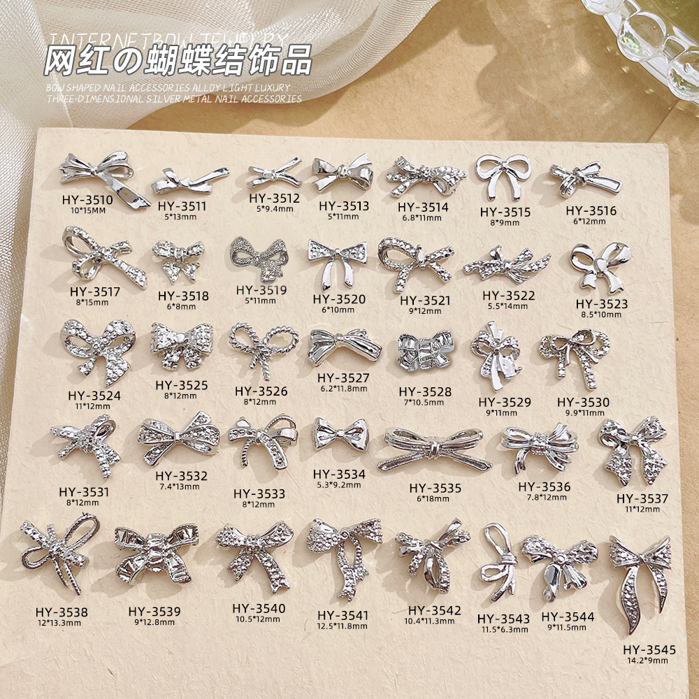 New white K bow nail art accessory, a popular light luxury three-dimensional alloy butterfly bow tie accessory for diy nail decoration