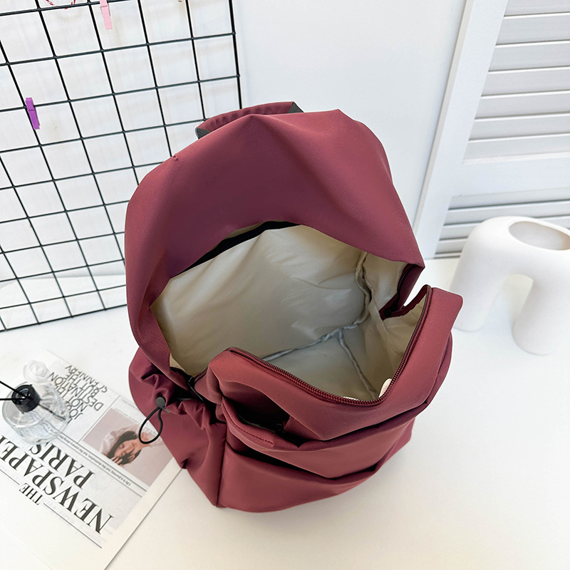 New large-capacity solid color backpacks for girls in foreign trade, simple and elegant school bags for junior and senior high school students Application Scenario