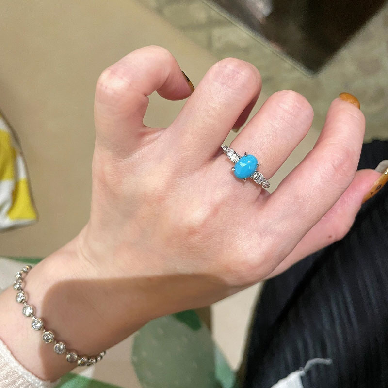 Retro de alta clase sentido de cuatro patas huevo turquesa anillo de lujo ligero diseño de nicho sentido de temperamento de la dama de la moda de Hong Kong anillo de dedo índice