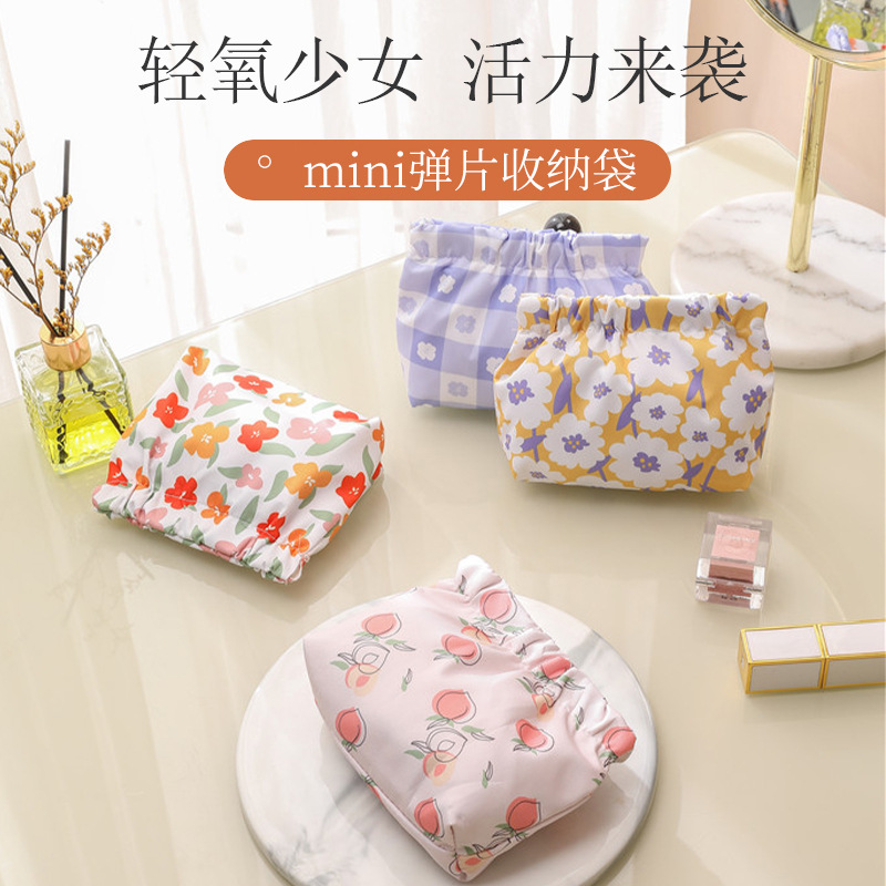 零钱包可爱防水弹片印花化妆品收纳包随身携带口红迷你时尚收纳袋