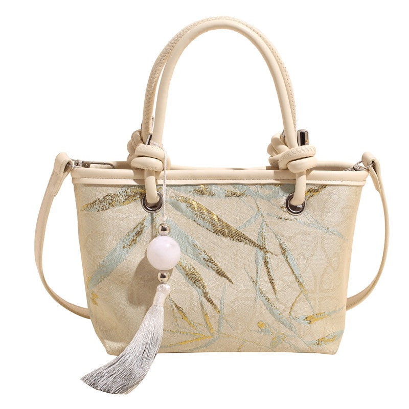 手拎新国潮式刺绣包包女2025春夏新款国风绣花时尚水桶包百搭斜挎包详情图5