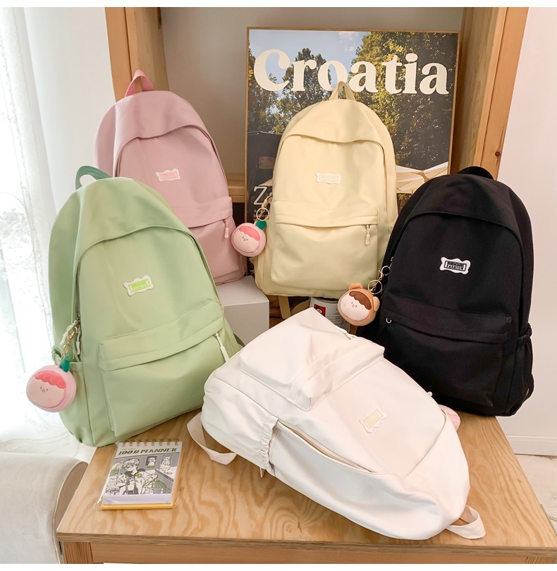 2023 Junior High School Girls Simple Leisure Travel Backpack Japanese Students Portable Korean Version Solid Color Large Capacity Backpack Application Scenario