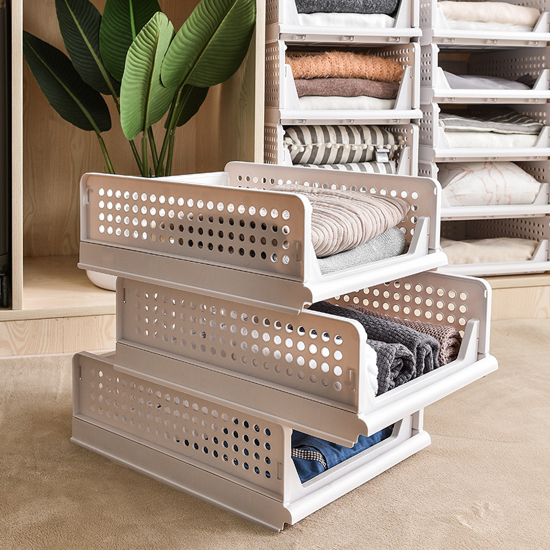 Clothes storage baskets can be stacked with drawer-type storage baskets, multi-layer partitions for wardrobe organization, and pull-out folding storage boxes