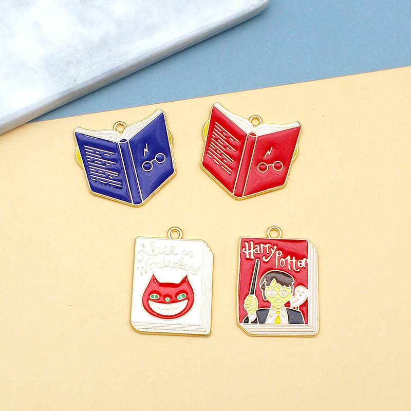 Cartoon Magic Academy Diy Accessories Magic Book School Uniform Badge Necklace Alloy Dripping Oil Key Chain Pendant Application Scenario