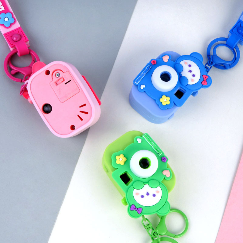 Cute Soft Glue Bow Tie Bear Projection Camera Keychain Female Car Key Chain Pendant Bag Hanging Decoration Small Gift Application Scenario
