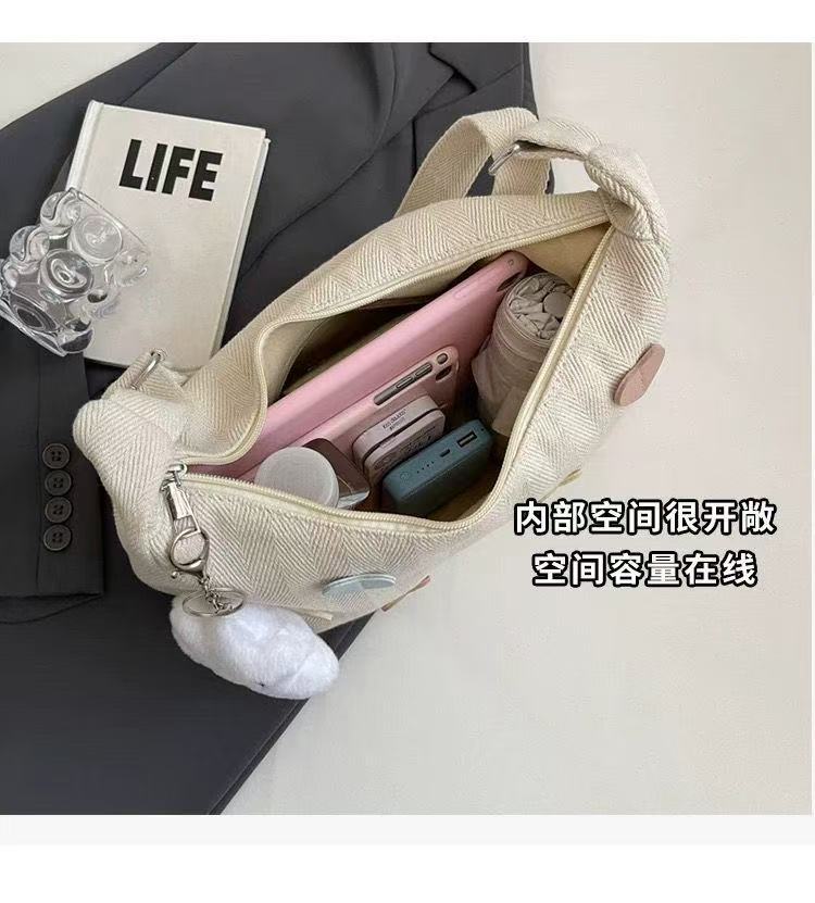 休闲帆布斜挎包女2025新款大学生上课潮牌小众百搭通勤单肩饺子包详情11