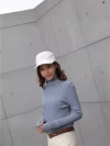 Simple and fashionable high round pit striped knitted sweater, soft and skin-friendly, moderate thickness, women's knitted sweater made in Dongguan Application Scenario