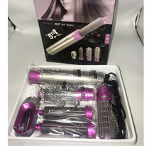 Multi-functional straightening and styling hair curler