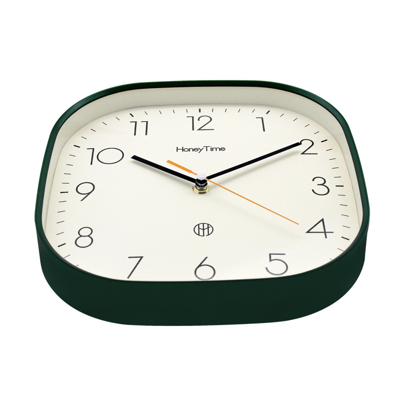 A 12-inch elliptical wall clock with a Nordic fashion and minimalist style, featuring a personalized, silent, and large-digital timepiece for the living room and bedroom Application Scenario
