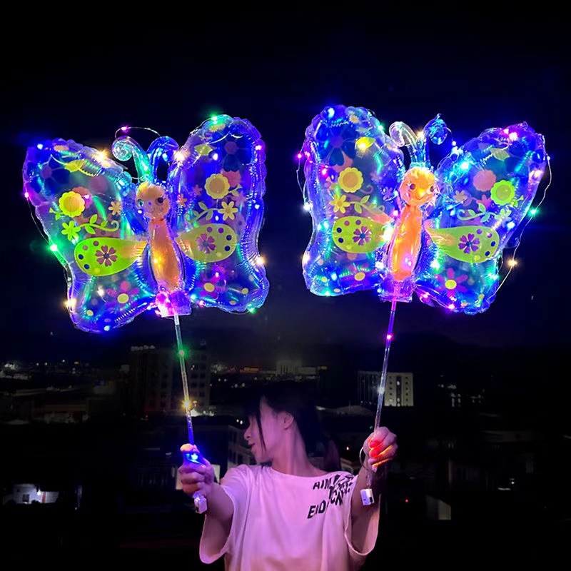 Luminous hand-held net red new magic night market kindergarten to push small gifts birthday decoration stall dolphin balloon Specification drawing
