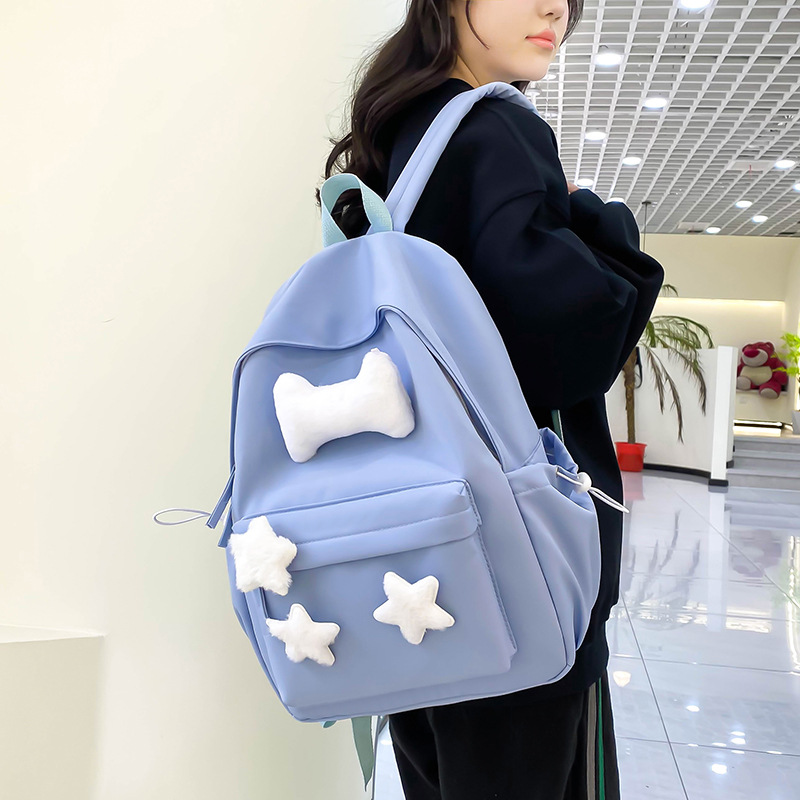 可爱少女小众自制五角星双肩包百搭大学生书包女休闲高中背包