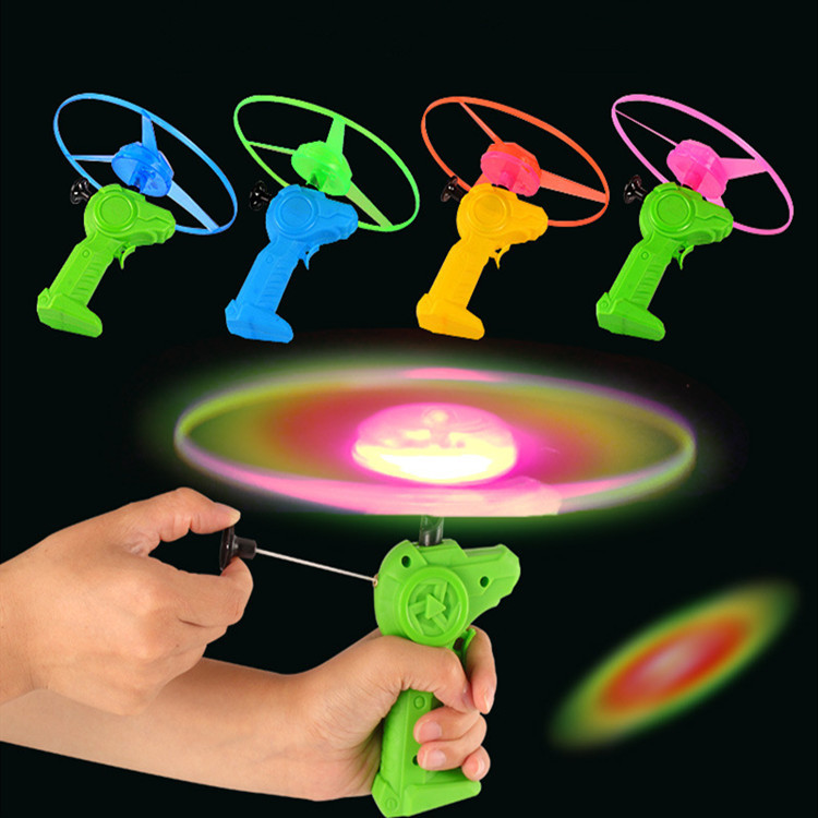 Trumpet combat flying saucer light pull thread flying saucer induction flash flying Frisbee children's square night market stalls toys
