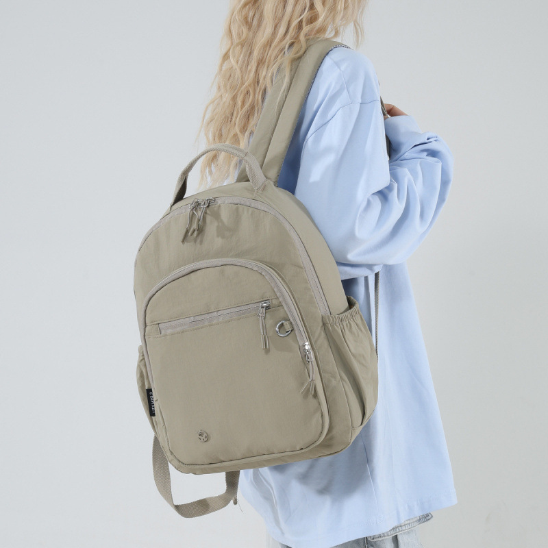 2025外贸跨境大容量轻便多隔层女士休闲百搭防泼水学生双肩包学生
