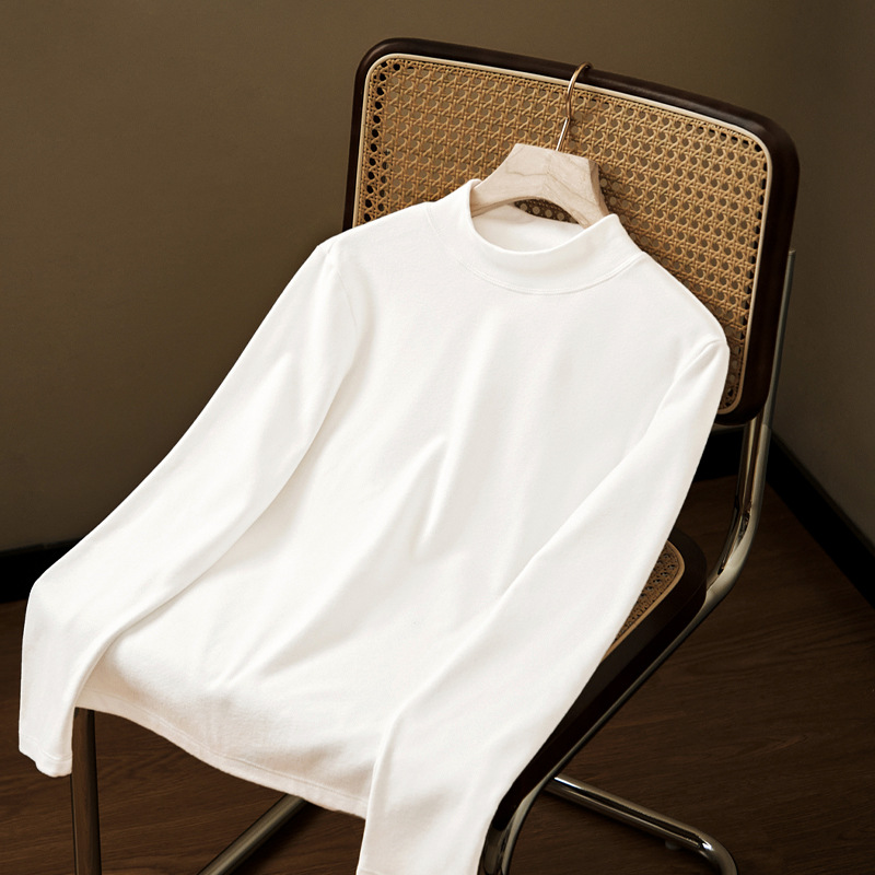 This autumn and winter warm double-sided fleece long-sleeved T-shirt is a solid color casual and versatile elastic top with a stand-up collar. It can be worn as a base layer for women