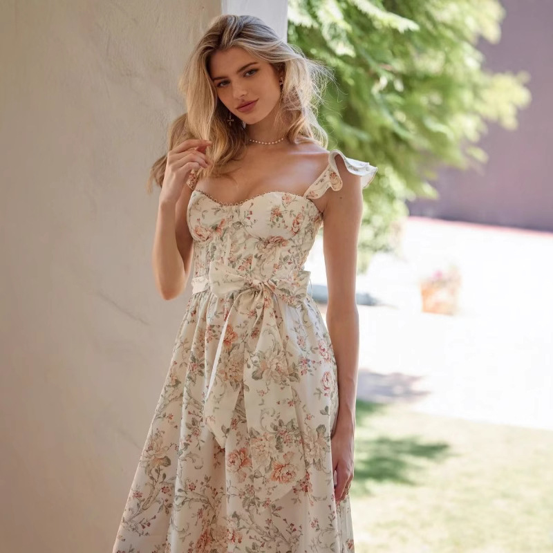Europa y Estados Unidos cross-border verano 2025 nuevo estilo francés estampado slim corte abierto lazo lazo vestido estilo europeo y americano