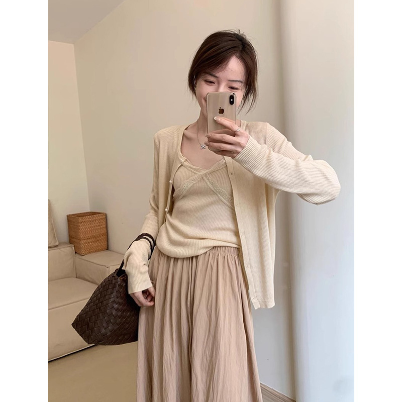 Dongguan Dalang Autumn New Women's knitted cardigan halter set, stylish sweater, versatile two-piece top details Picture