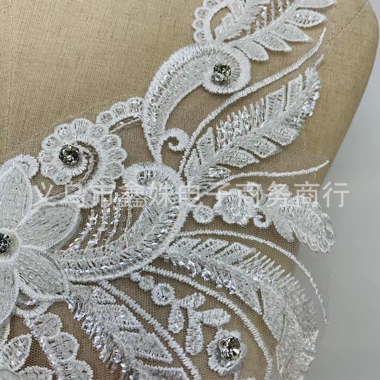 Hand-stitched mesh fabric with beaded thread embroidery on the front collar for clothing decoration details Picture