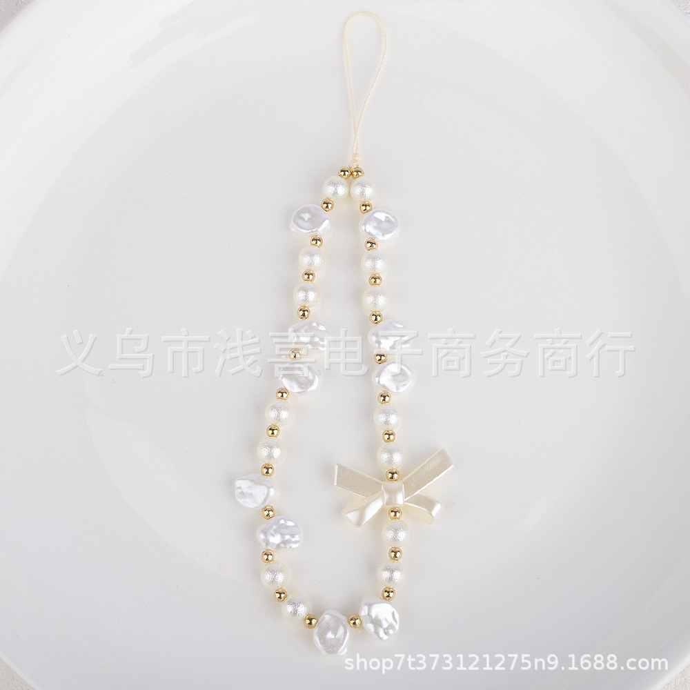 New European and American pearl bow heart-shaped mobile phone chain with beads, short mobile phone lanyard, wrist pendant, pendant and lanyard Item Picture