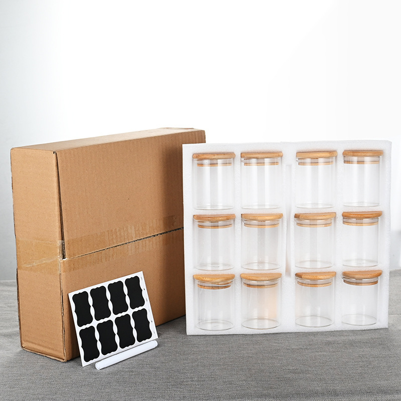 A 12-piece set of bamboo lid glass seasoning jars