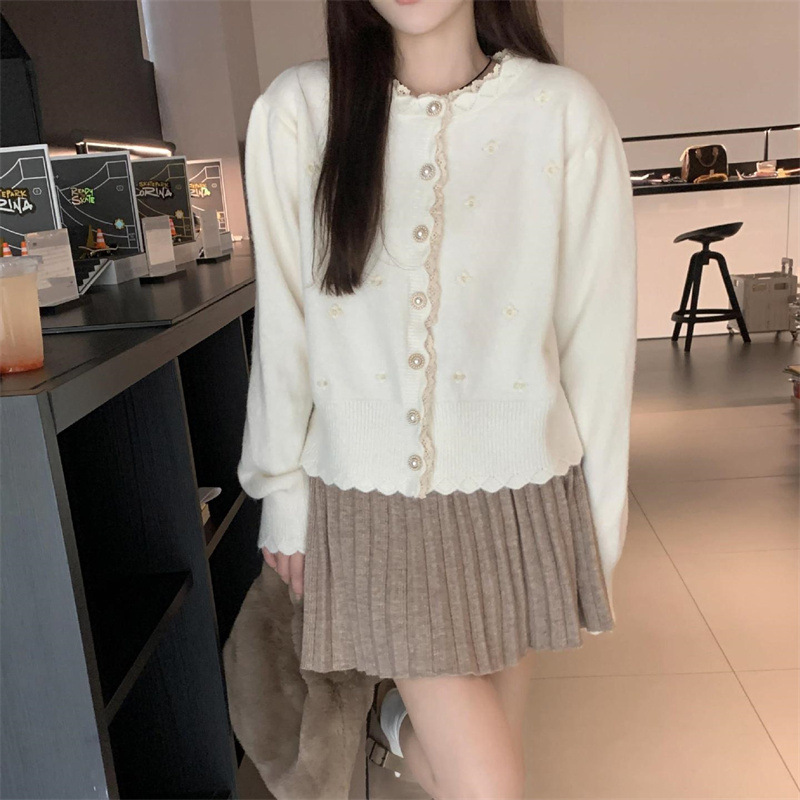 The new Spring and Autumn 2024 collection features a multi-color lace patchwork knitted cardigan for women with a loose design and a short sweater jacket. It's a trendy top