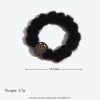 The milk coffee color hair tie exudes a high-end feel. It's a new autumn and winter style with a plush hair band and high-elasticity diamond-encrusted light luxury hair tie details Picture