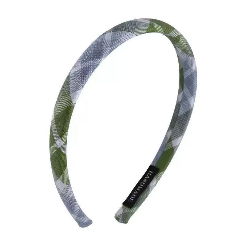 The new, fresh and fair blue and green checkered hair band is fashionable and niche. It features an academic headband, a simple hair tie and hair accessory Item Picture