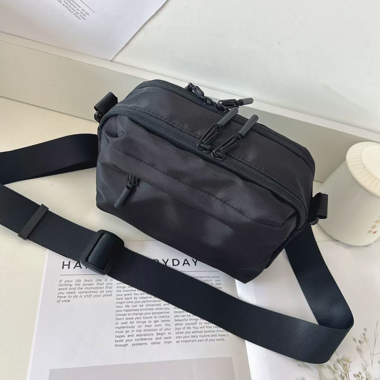 A new Japanese waterproof Oxford fabric black small square bag, a lightweight and casual multi-pocket crossbody bag for men and women, and a mobile phone crossbody bag details Picture