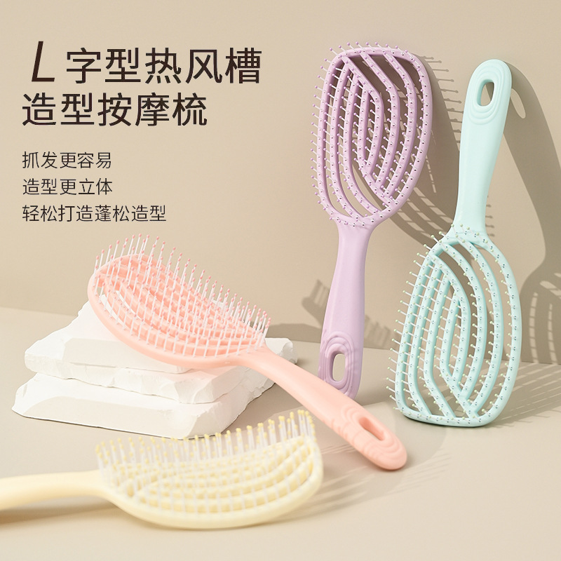 梳子/牛角梳/精致小梳子/气囊梳子/牛角梳子产品图