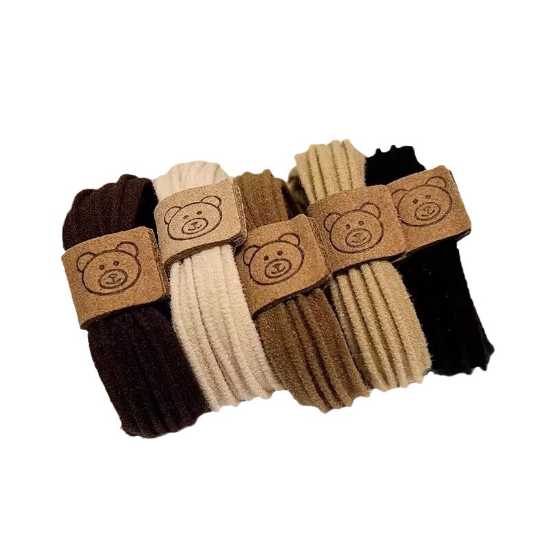 Versión coreana cute bear head cord cordón de cuero de alta elasticidad cordón de pelo para mujeres nuevo estilo hoyo croqueta duradera tocados fundas de cuero Item Picture
