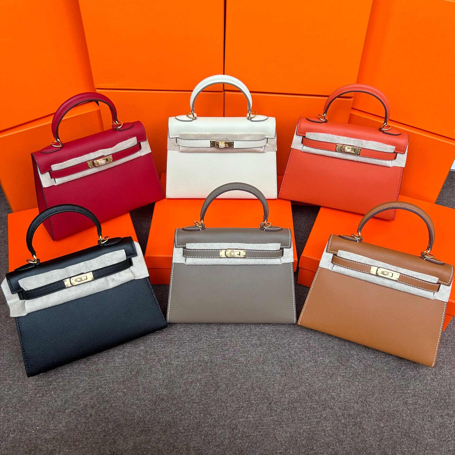 The 2025 new trendy genuine leather hand-print Kelly bag, the second-generation mini platinum bag, is a high-end quality hand-carry and crossbody women's bag full figure