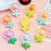 Factory-customized transparent cartoon flowers, diy resin accessories, hair clips, hair ornaments, semi-finished products, mobile phone cases, handcrafted materials Application Scenario