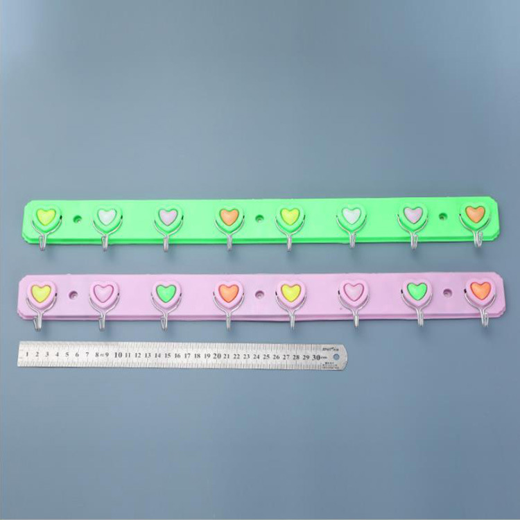 628 Peach Heart 8-piece hook Adhesive hook, plastic adhesive hook 8-piece hook, clothing hook behind the door, 2-yuan store supply details Picture