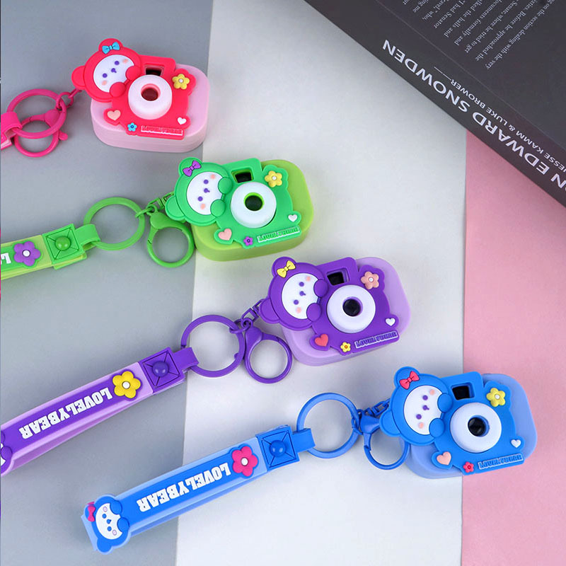 Cute Soft Glue Bow Tie Bear Projection Camera Keychain Female Car Key Chain Pendant Bag Hanging Decoration Small Gift details Picture