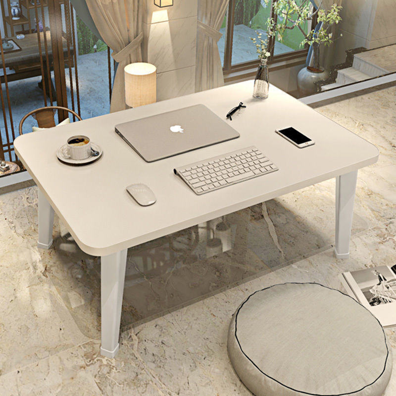 A small table on the bed, a seat in the bedroom, a foldable student dormitory table board, a desk, a cute ins carpet, a computer